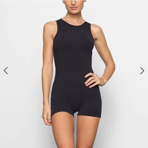 Skims raw edge romper new with tags size large